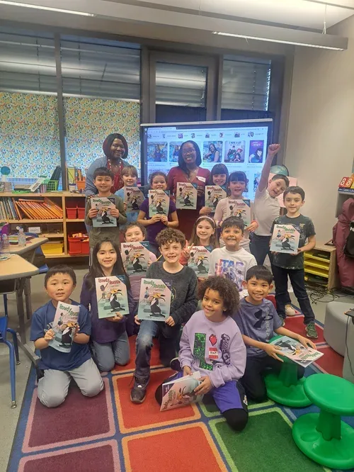 Students holding their copies of Bowl of Doubt