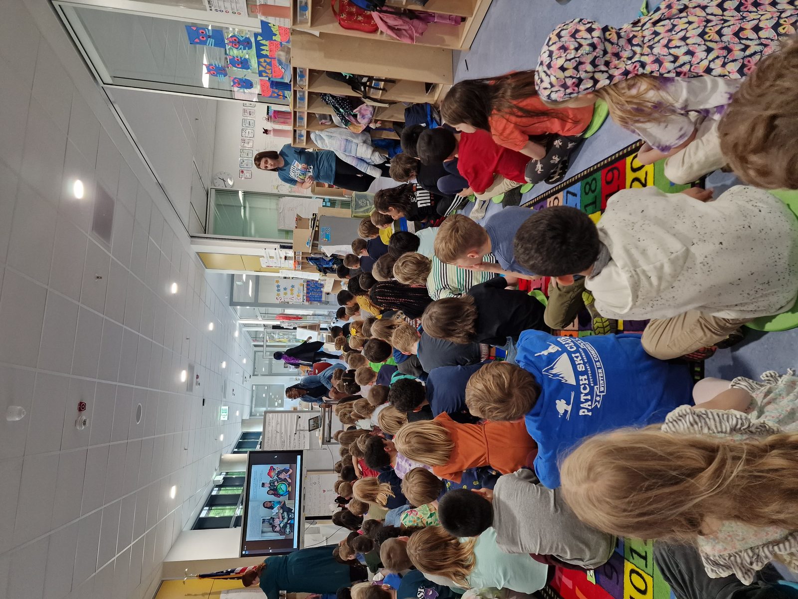 Classroom author visit on the reading rug