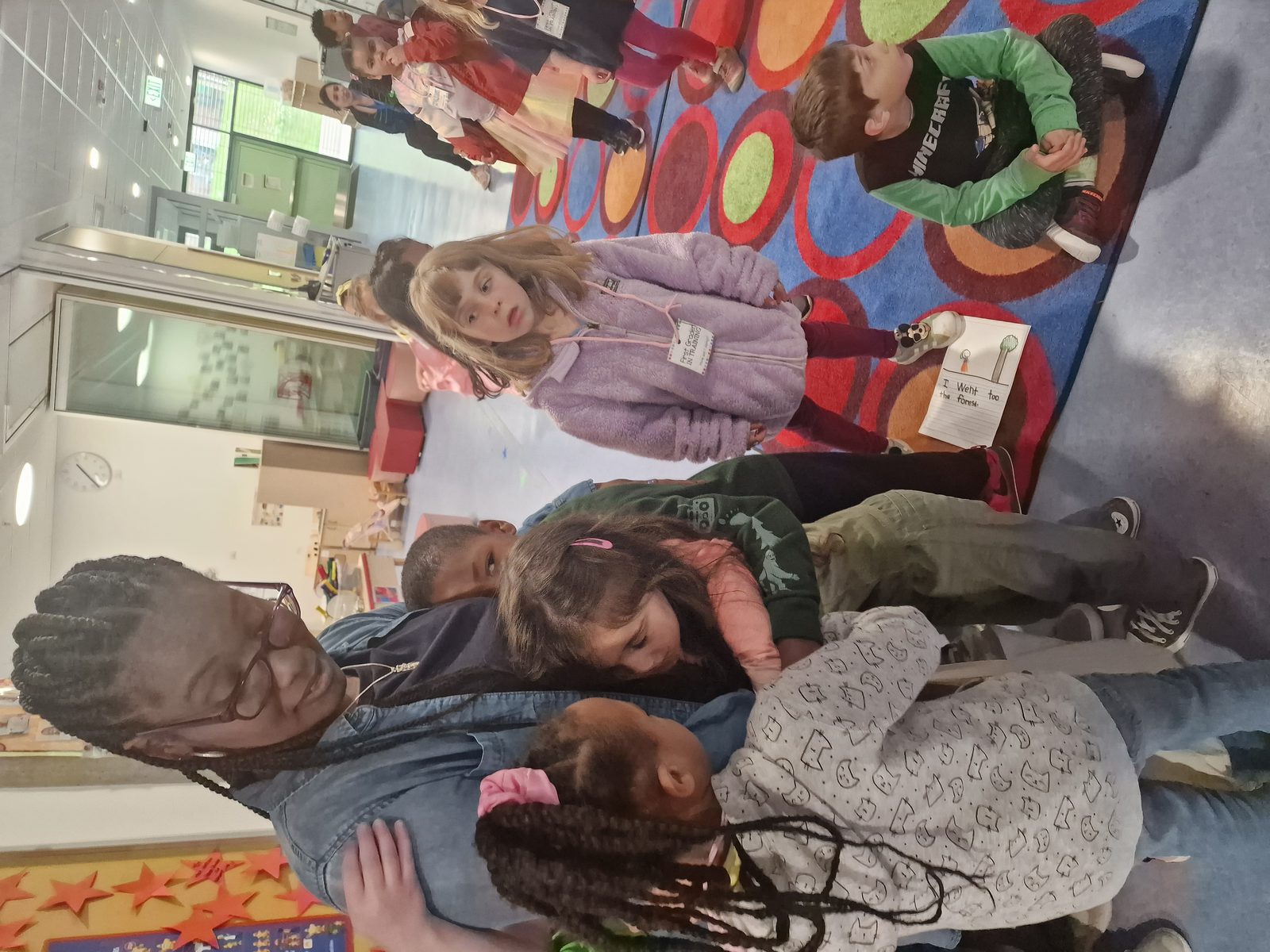 Students greeting Shermaine in the hallway